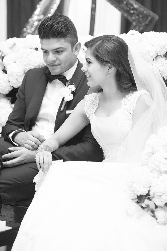 Black and white wedding candid portrait photography for bride and groom M&M on their special day shot by Kevin Mark Pass Photography