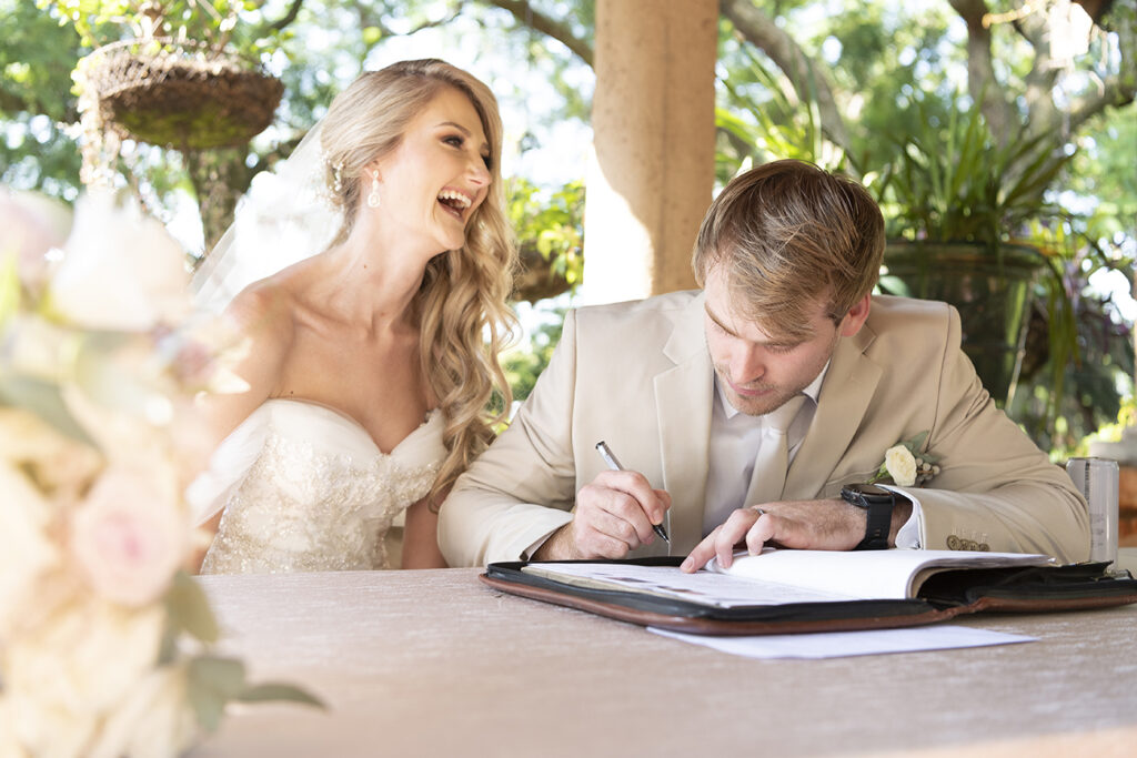 Candid moment for S&J wedding by Kevin Mark Pass Photography, bridal makeup by Storm Pass