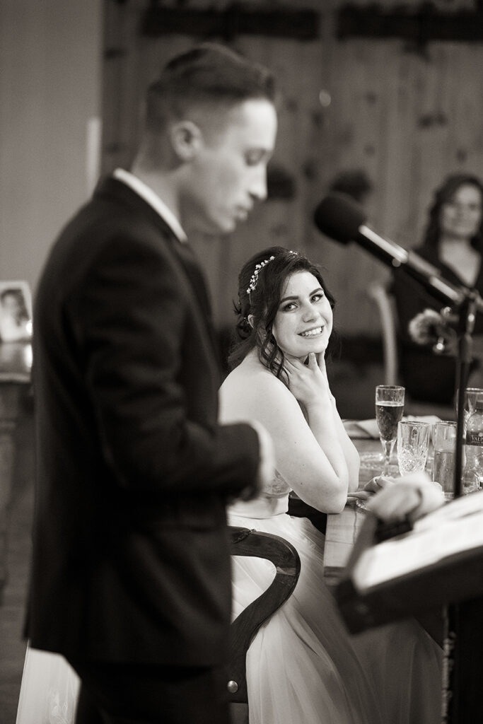 Candid sepia/ black & white wedding photography shot by Kevin Mark Pass Photography, bridal makeup by Storm Pass